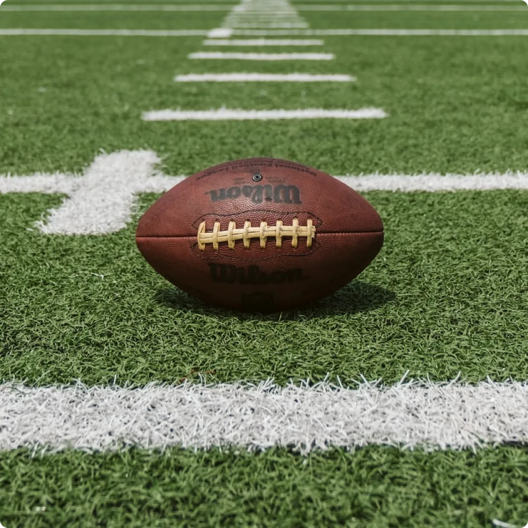 Football sitting on field